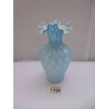 An antique blue satin glass vase, 17 cm tall.