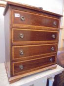 A small mahogany four drawer chest, COLLECT ONLY.