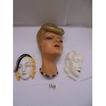 Two ceramic art deco lady wall masks and a plaster wall mask.