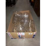 A box of oil lamp chimneys storm lanterns shades etc COLLECT ONLY