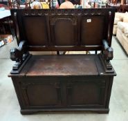 A vintage oak monks bench/storage box with lion arms COLECT ONLY