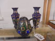 A pair of Chinese Cloissonne vases and a Cloissonne teapot.
