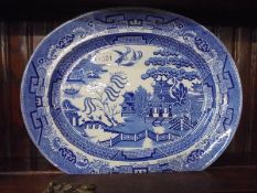 A large Victorian blue and white willow pattern meat platter, COLLECT ONLY.
