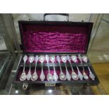 A set of 12 silver plate Royal Family teaspoons in wooden case.