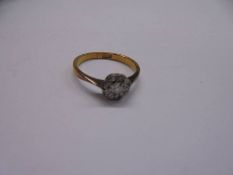 An 18ct gold and diamond cluster ring, size I, 1.7 grams.
