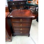 A dark wood stained 4 drawer bedroom chest COLLECT ONLY