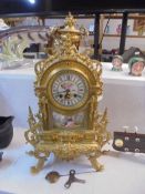 A french ormolu and enamel mantel clock.