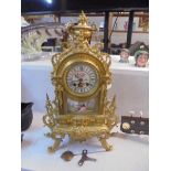 A french ormolu and enamel mantel clock.