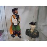 A Royal Doulton figure 'CAvalier' HN2718 and a Staffordshire Montgomery jug.