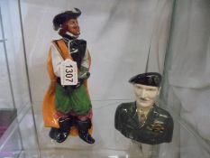 A Royal Doulton figure 'CAvalier' HN2718 and a Staffordshire Montgomery jug.