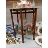 A brass and wood folding table, COLLECT ONLY.