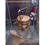 A copper spirit kettle and a copper powder flask.