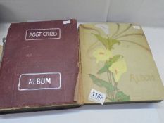 Two Edwardian albums of postcards.