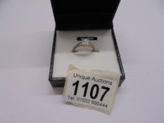 A 9ct gold ring set white stone, size N half, 1.7 grams.