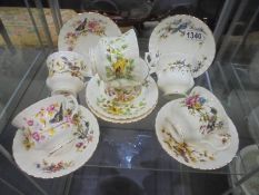 A set of six Royal Albert bird decorated tea cups and saucers, COLLECT ONLY.