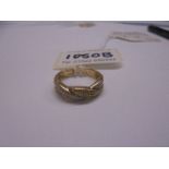 A 14ct gold double crossover diamond ring, size R, 3.4 grams. (diamaond approx. 0.25cts).