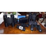 4 small binoculars, 3 with cases