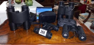 4 small binoculars, 3 with cases