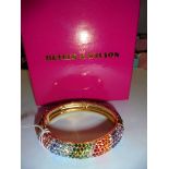 A boxed Butler & Wilson sparkly bangle.