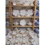In excess of 60 pieces of Aynsley rose decorated table ware, COLLECT ONLY.