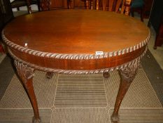 An oval mahogany dining table, COLLECT ONLY.
