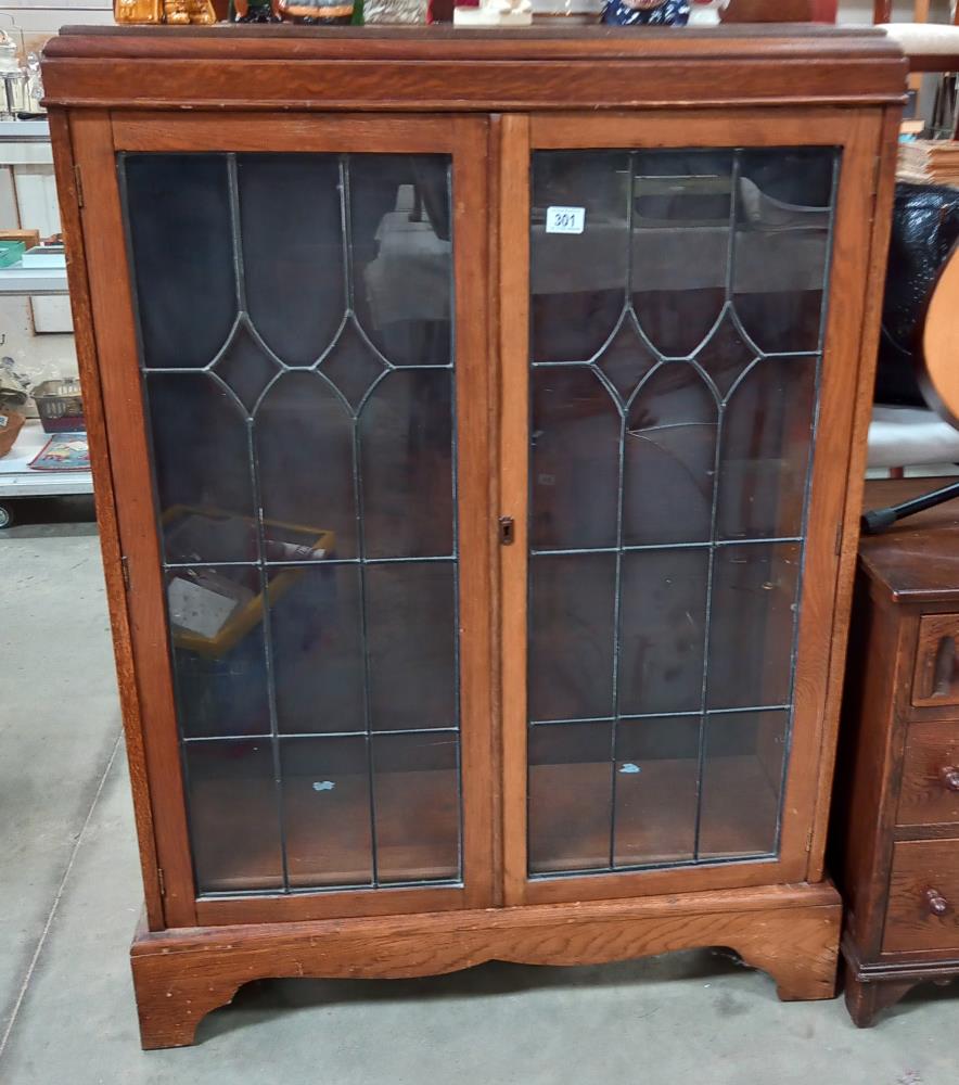 1930's oak display cabinet with leaded glass doors COLLECT ONLY