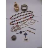 Three stone necklaces, a white metal bangle, a pill box etc.,