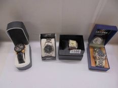 Four boxed gent's wrist watches.