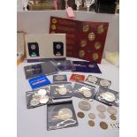 A mixed lot of collector's and other coins including Beatrix Potter and Paddington 50p pieces.