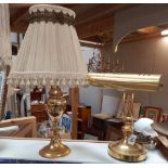 A brass table lamp and brass desk bankers lamp