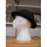 A Bowler hat by Christy's London, size approximately 56cm, in good condition.