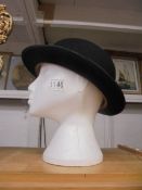 A Bowler hat by Christy's London, size approximately 56cm, in good condition.