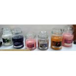 4 large and 2 medium new aromatic candles