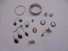 A quantity of silver jewellery including bangle, earrings, cameo etc., and items of yellow metal