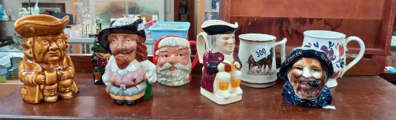 A selection of character and Toby jugs etc including Royal Doulton Santa Claus, Portmeirion Welsh
