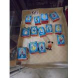 13 boxed and 1 un-boxed Marx Disneykins figures.