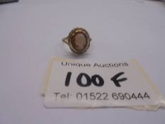 A 9ct gold cameo ring, profile of a young woman in a ropework mount, size K, 2.5 grams.