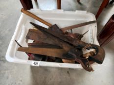 A large box of old tools including saws, spanners, hammers etc COLLECT ONLY
