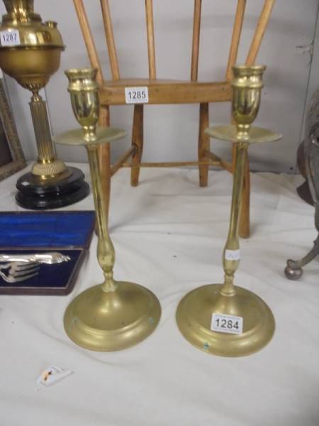A good pair of brass candlesticks.