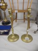 A good pair of brass candlesticks.