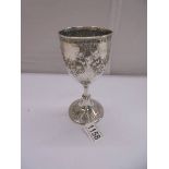 An embossed silver goblet, hallmarked Birmingham 1868/69, maker S W, 16 cm tall, 5.3 ounces.