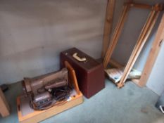 A cased Singer sewing machine etc