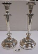 A pair of silver plate on copper candlesticks, 25cm, (plate worn)