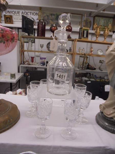 A good quality cut glass decanter and eight glasses, COLLECT ONLY.