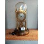 A BHA anniversary clock under glass dome with key IWO COLLECT ONLY