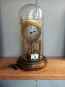 A BHA anniversary clock under glass dome with key IWO COLLECT ONLY