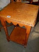 An oak occasional table with barley twist supports (crack to top) COLLECT ONLY.