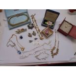 A mixed lot of costume jewellery including necklaces, earrings, brooches etc., (one necklace a/f).