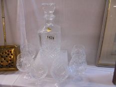 A cut glass decanter and six brandy goblets. COLLECT ONLY.
