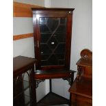 A mahogany astragal glazed corner display cabinet on stand. COLLECT ONLY.
